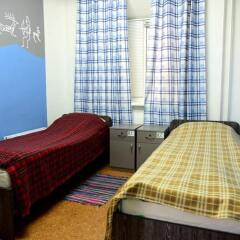 Гостиница Lucomoria Hostel Abakan в Абакане 4 отзыва об отеле, цены и фото номеров - забронировать гостиницу Lucomoria Hostel Abakan онлайн Абакан комната для гостей фото 2