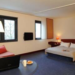 Отель Novotel Suites München Parkstadt Schwabing комната для гостей фото 3