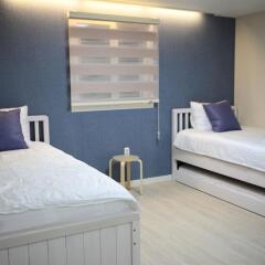 Отель Albergue Guesthouse Korea Южная Корея, Сеул - отзывы, цены и фото номеров - забронировать отель Albergue Guesthouse Korea онлайн комната для гостей фото 5