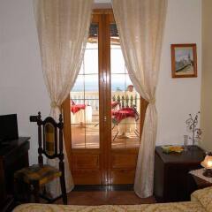 Отель Holiday House Le Palme Италия, Амальфи - отзывы, цены и фото номеров - забронировать отель Holiday House Le Palme онлайн удобства в номере фото 2