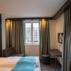 Отель Motel One Leipzig - Nikolaikirche Германия, Лейпциг - отзывы, цены и фото номеров - забронировать отель Motel One Leipzig - Nikolaikirche онлайн комната для гостей