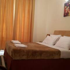 Отель Al Raein Hotel Apartments ОАЭ, Дубай - отзывы, цены и фото номеров - забронировать отель Al Raein Hotel Apartments онлайн комната для гостей фото 5