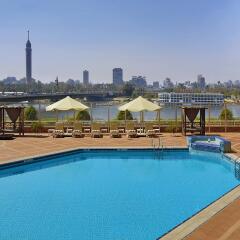 Отель Ramses Hilton бассейн