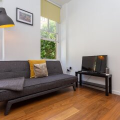 Апартаменты 1 Bedroom Apartment In Fitzrovia Sleeps 4 комната для гостей фото 4