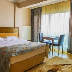 Perla Otel Турция, Дикили - отзывы, цены и фото номеров - забронировать отель Perla Otel онлайн комната для гостей фото 2
