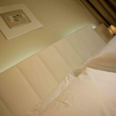 Отель Ferretti Beach Resort Римини сейф в номере