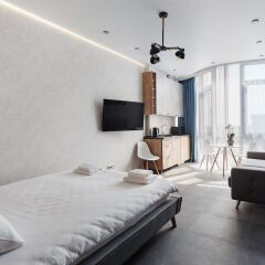 Апартаменты Arcadia Sky Apartments комната для гостей