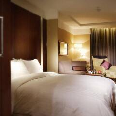Отель Crowne Plaza Chongqing Jiefangbei комната для гостей