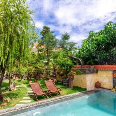 Отель Bonsai Homestay Хойан с домашними животными