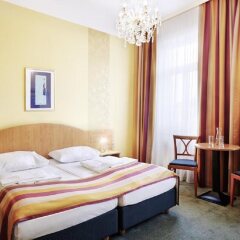 Отель Boutique Hotel Donauwalzer Австрия, Вена - 7 отзывов об отеле, цены и фото номеров - забронировать отель Boutique Hotel Donauwalzer онлайн комната для гостей фото 2