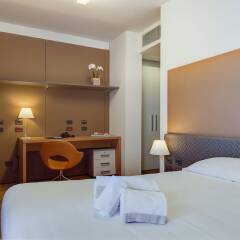 Отель Camplus Living Bononia в номере фото 2