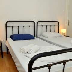 Апартаменты Filopappou view renovated apartment комната для гостей фото 2