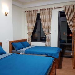 Отель Quang Son Homestay Далат комната для гостей фото 5