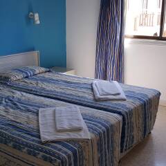 Отель Cosmelenia Hotel Apartments Кипр, Айя-Напа - отзывы, цены и фото номеров - забронировать отель Cosmelenia Hotel Apartments онлайн комната для гостей