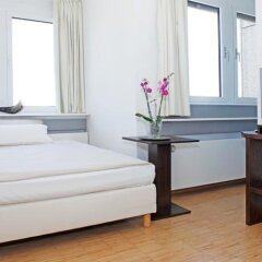Отель Paragon Apartments Германия, Франкфурт-на-Майне - отзывы, цены и фото номеров - забронировать отель Paragon Apartments онлайн комната для гостей фото 3