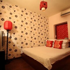 Flowering House Courtyard Hotel сейф в номере