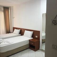 Апартаменты Sunny Bliss Apartments with Seaview Дуррес комната для гостей фото 3