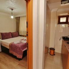 Апартаменты Camelot Apartment в номере фото 2