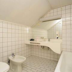 Отель City Living Schøller Hotel Норвегия, Тронхейм - отзывы, цены и фото номеров - забронировать отель City Living Schøller Hotel онлайн ванная