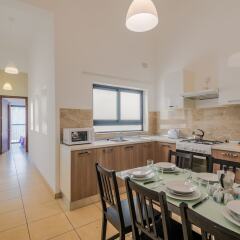 Апартаменты Blue Harbour 4 Seafront apartment в номере
