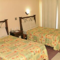Plaza Palenque Hotel & Convention Center комната для гостей