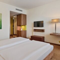 Отель Austria Trend Hotel Doppio Австрия, Вена - 4 отзыва об отеле, цены и фото номеров - забронировать отель Austria Trend Hotel Doppio онлайн комната для гостей фото 2