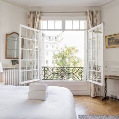 Отель Tour Maubourg - Eiffel Tower Apartment Франция, Париж - отзывы, цены и фото номеров - забронировать отель Tour Maubourg - Eiffel Tower Apartment онлайн комната для гостей фото 3
