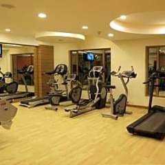 Отель Cambay Grand фитнесс-зал фото 4