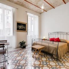 Апартаменты Monti Colosseum Apartment-Urbana комната для гостей