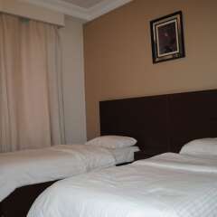 Alballouti Hotel Suites Амман комната для гостей фото 13