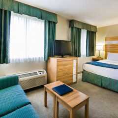Отель Comfort Suites Seven Mile Beach Каймановы острова, Севен-Майл-Бич - отзывы, цены и фото номеров - забронировать отель Comfort Suites Seven Mile Beach онлайн комната для гостей фото 2
