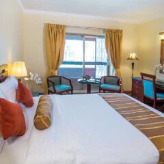 Отель Holiday International Sharjah комната для гостей фото 4