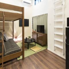 Отель TATERU bnb SUMIYOSHI A комната для гостей