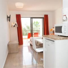 Отель Apartamentos Sol Romantica удобства в номере