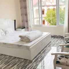 Отель Babycat Guesthouse & Cafe Вьетнам, Халонг - отзывы, цены и фото номеров - забронировать отель Babycat Guesthouse & Cafe онлайн комната для гостей фото 5