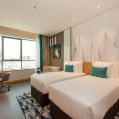 Flora Inn Hotel Dubai Airport комната для гостей