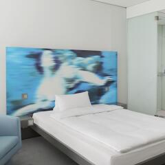 Отель INNSIDE by Meliá München Parkstadt Schwabing комната для гостей