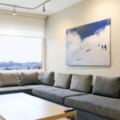 Апартаменты Cozy Flats Defne Apartment Стамбул комната для гостей фото 5