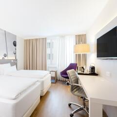 Отель NH Collection Berlin Mitte Am Checkpoint Charlie 4* Улучшенный номер с разными типами кроватей фото 11