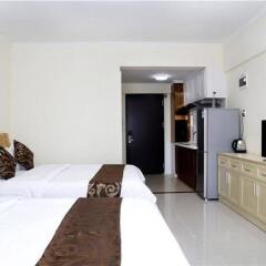 Апартаменты Xingfu Huafu Apartment комната для гостей фото 3
