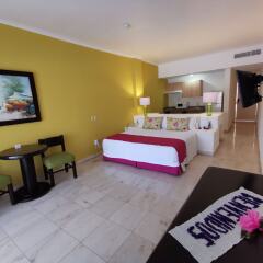 Отель Canto del Sol Plaza Vallarta Beach & Tennis Resort - Все включено Мексика, Пуэрто-Вальярта - отзывы, цены и фото номеров - забронировать отель Canto del Sol Plaza Vallarta Beach & Tennis Resort - Все включено онлайн сейф в номере