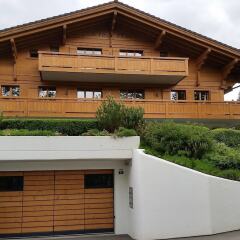 Апартаменты Gstaad Perfect Winter Luxury Apartment парковка
