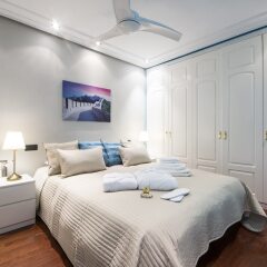 Апартаменты Alaia Holidays Apartments & Suite Carretas 33 комната для гостей