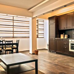 Апартаменты Travellino Serviced Apartments в номере