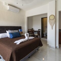 Отель Maui Suites by GuruHotel Мексика, Плая-дель-Кармен - отзывы, цены и фото номеров - забронировать отель Maui Suites by GuruHotel онлайн комната для гостей фото 4