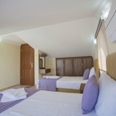 Villa Baysal 2 by Akdenizvillam Турция, Патара - отзывы, цены и фото номеров - забронировать отель Villa Baysal 2 by Akdenizvillam онлайн комната для гостей фото 3