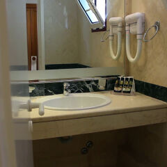 Отель Mitsis Rinela Beach Resort & Spa - All Inclusive ванная