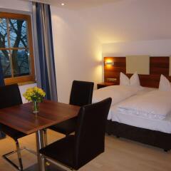 Boutique Hotel & Apartments Am Essigmanngut Аниф комната для гостей фото 3