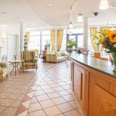 Отель Domicil Berlin By Golden Tulip Берлин интерьер отеля