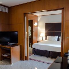 Отель Hôtel Goldstar Resort & Suites удобства в номере